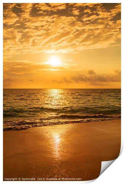 Sunset reflecting on ocean at tourist destination Bahamas Print by Spotmatik 