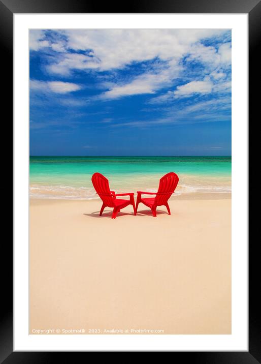 Tranquil holiday destination with red chairs on beach Framed Mounted Print by Spotmatik 