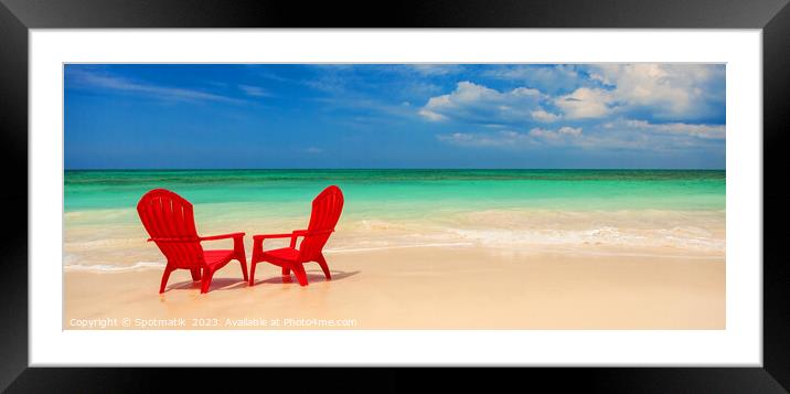 Panoramic red travel chairs on white sandy beach Framed Mounted Print by Spotmatik 