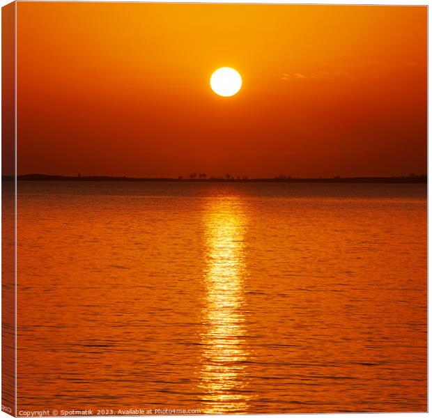 Tropical ocean sunset over ocean water luxury destination  Canvas Print by Spotmatik 