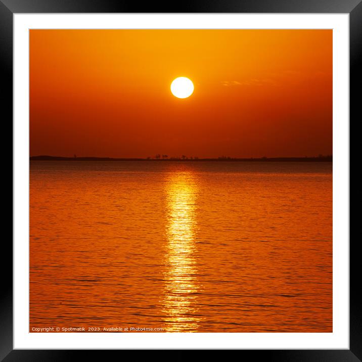 Tropical ocean sunset over ocean water luxury destination  Framed Mounted Print by Spotmatik 