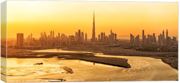 Aerial sunset view of Dubai city skyscrapers UAE Canvas Print by Spotmatik 