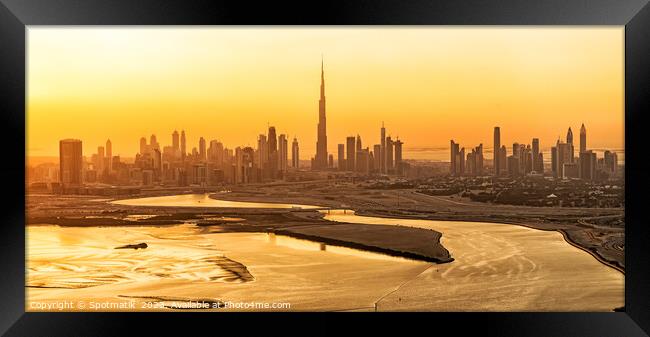 Aerial sunset view of Dubai city skyscrapers UAE Framed Print by Spotmatik 