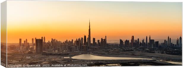 Aerial Panorama sunset Dubai city modern skyscrapers UAE Canvas Print by Spotmatik 