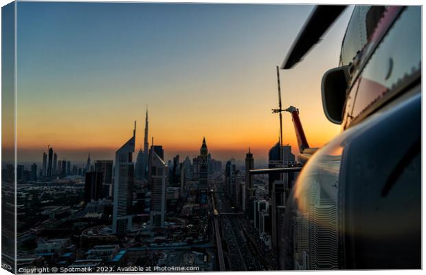 Aerial Dubai sunset helicopter flying Sheikh Zayed Road Canvas Print by Spotmatik 