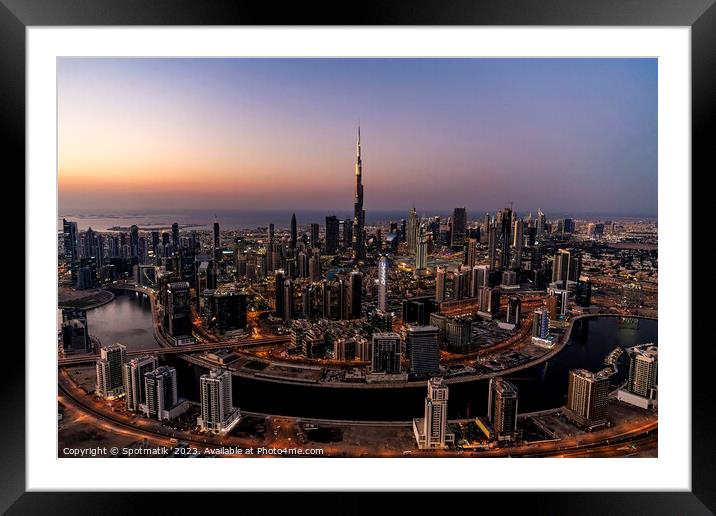 Aerial sunset view Dubai Skyline Burj Khalifa Skyscraper  Framed Mounted Print by Spotmatik 
