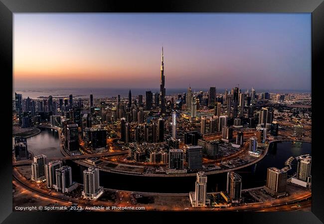 Aerial sunset view Dubai Skyline Burj Khalifa Skyscraper  Framed Print by Spotmatik 