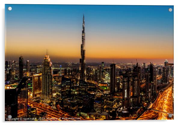 Aerial illuminated Dubai at sunset Burj Khalifa UAE Acrylic by Spotmatik 