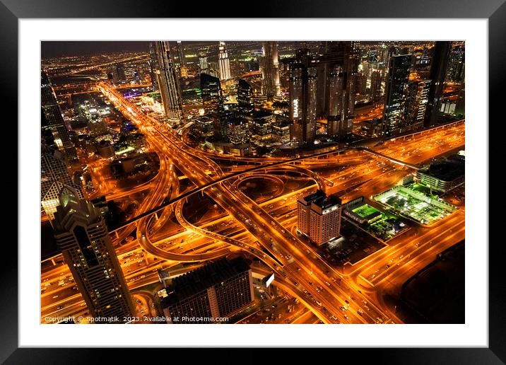 Aerial Dubai view at night Sheikh Zayed Road  Framed Mounted Print by Spotmatik 