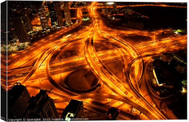 Aerial Dubai view Sheikh Zayed Road at night  Canvas Print by Spotmatik 