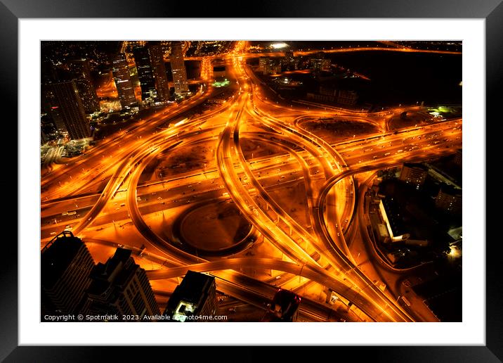 Aerial Dubai view Sheikh Zayed Road at night  Framed Mounted Print by Spotmatik 