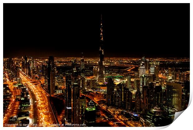 Aerial Dubai illuminated night view of Burj Khalifa  Print by Spotmatik 