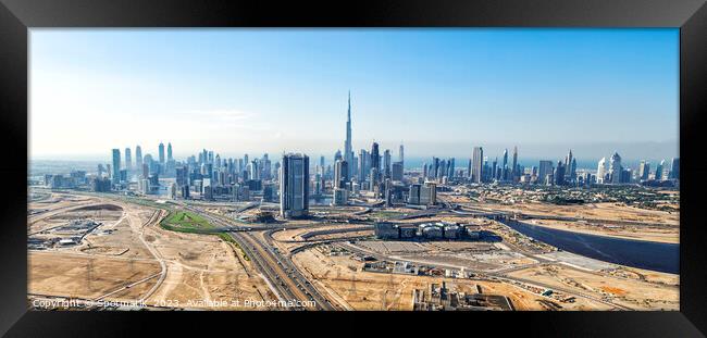 Aerial Panorama view Dubai center city skyscrapers UAE Framed Print by Spotmatik 