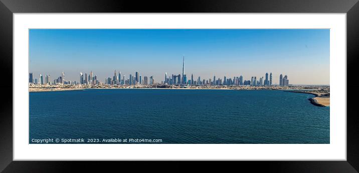 Aerial Panorama coastline cityscape view of Dubai skyscrapers  Framed Mounted Print by Spotmatik 