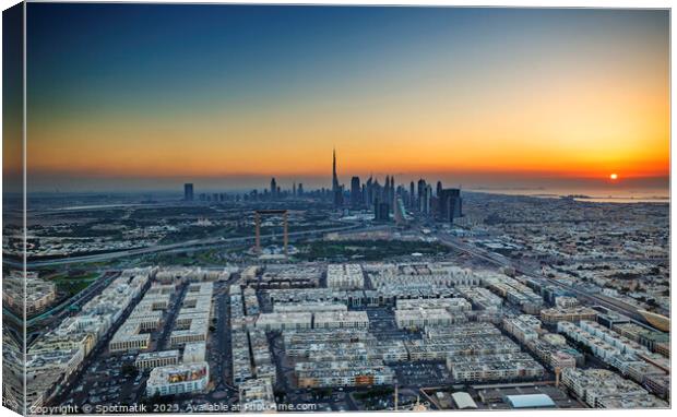 Aerial sunset view of Dubai city skyscrapers UAE  Canvas Print by Spotmatik 