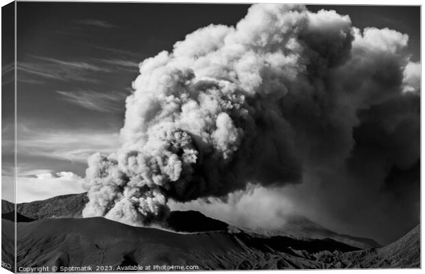 Erupting smoke and ash from Mount Bromo summit  Canvas Print by Spotmatik 