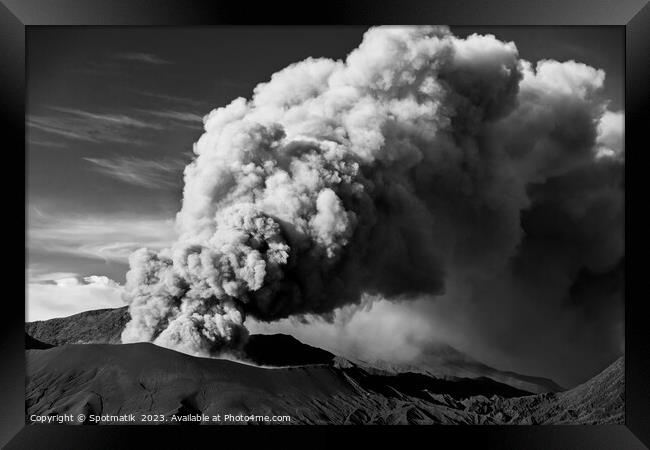 Erupting smoke and ash from Mount Bromo summit  Framed Print by Spotmatik 