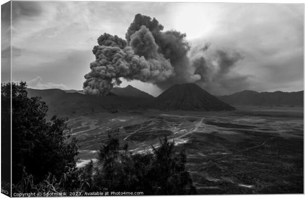Indonesia ash cloud from active Mount Bromo volcano  Canvas Print by Spotmatik 