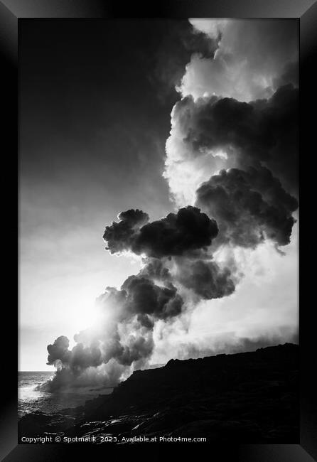 Magma flowing from Kilauea volcano into the Pacific  Framed Print by Spotmatik 