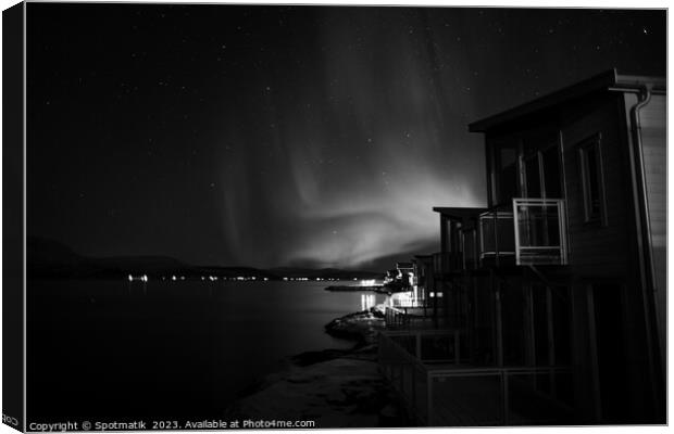Aurora Borealis in night sky Arctic Circle Norway Canvas Print by Spotmatik 