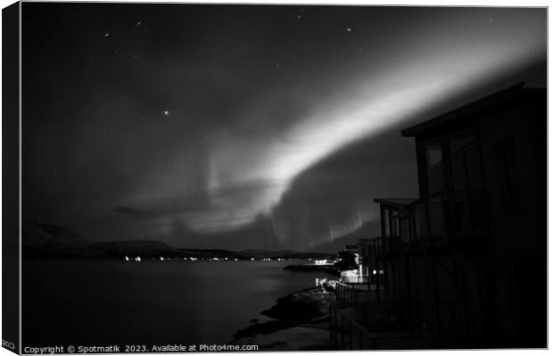 Northern Lights display in sky Arctic Circle Norway Canvas Print by Spotmatik 