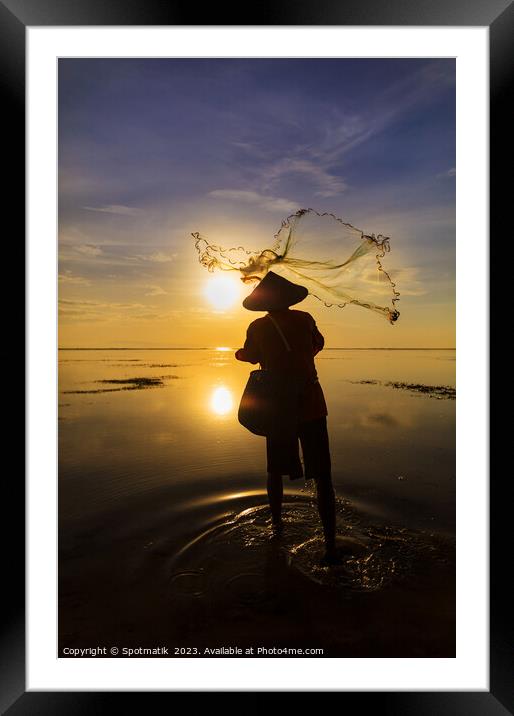 Balinese fisherman casting net Flores sea sunrise Framed Mounted Print by Spotmatik 