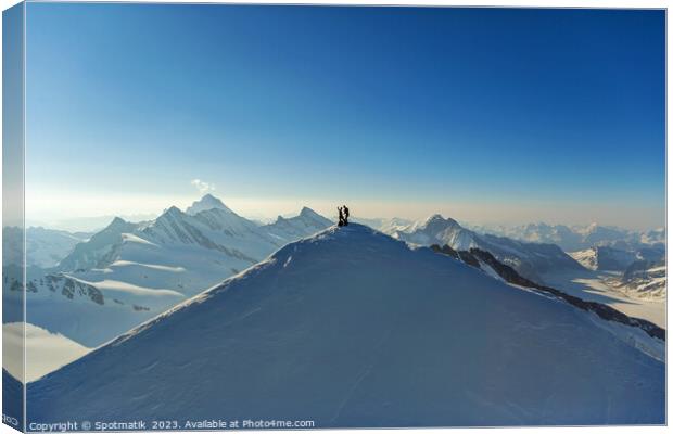 Aerial view Switzerland climbers on mountain summit Europe Canvas Print by Spotmatik 