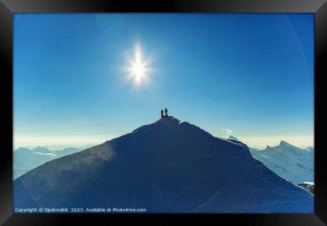 Aerial view Switzerland climbers on mountain summi Framed Print by Spotmatik 