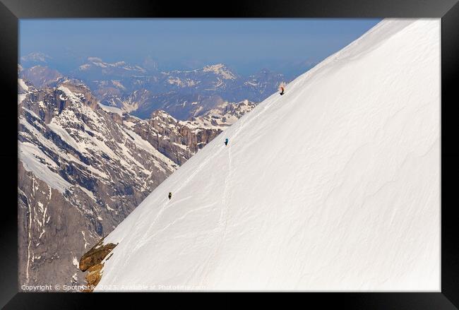 Aerial Switzerland mountain team climbing snow face Europe Framed Print by Spotmatik 