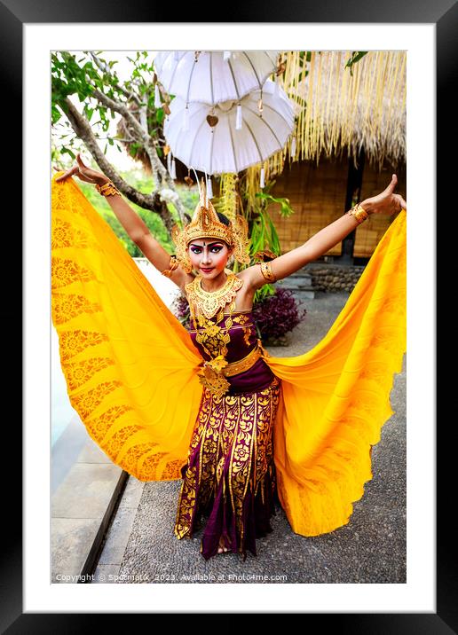 Balinese female dancer performing Ceremonial traditional dance Framed Mounted Print by Spotmatik 