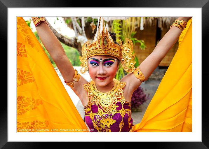 Balinese female dancer performing Ceremonial traditional dance Framed Mounted Print by Spotmatik 