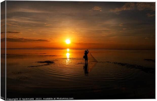 Silhouette Balinese sunrise fisherman casting net Flores sea Canvas Print by Spotmatik 
