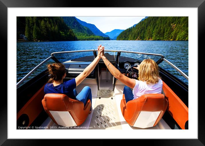 Vancouver Caucasian females out celebrating in powerboat Canada Framed Mounted Print by Spotmatik 