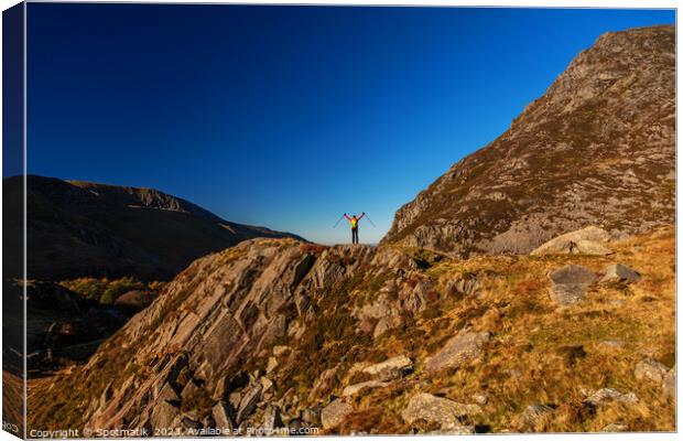 Scenic views across Snowdonia for outdoor female hiker Canvas Print by Spotmatik 