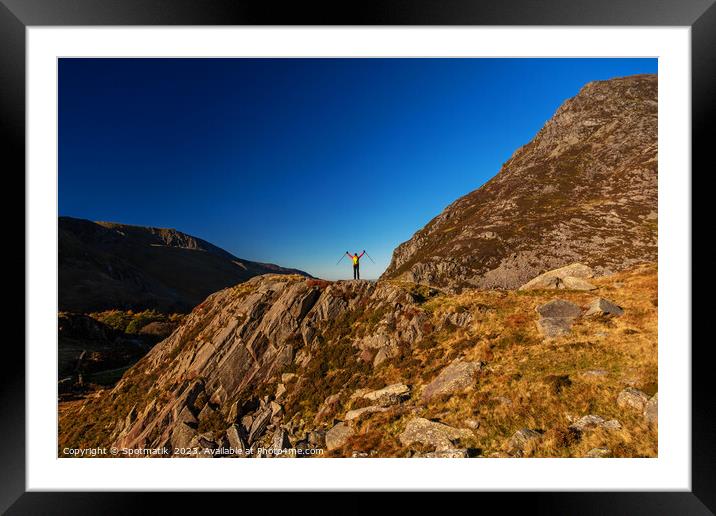 Scenic views across Snowdonia for outdoor female hiker Framed Mounted Print by Spotmatik 