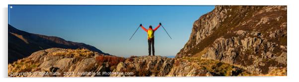 Panoramic happy female backpacker nearing mountain summit Acrylic by Spotmatik 