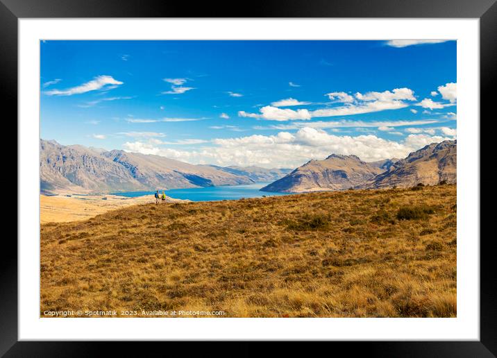 Active seniors on hiking adventure exploring New Zealand Framed Mounted Print by Spotmatik 