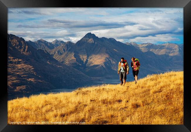 The Remarkables Otago young adventure couple vacation trekking Framed Print by Spotmatik 