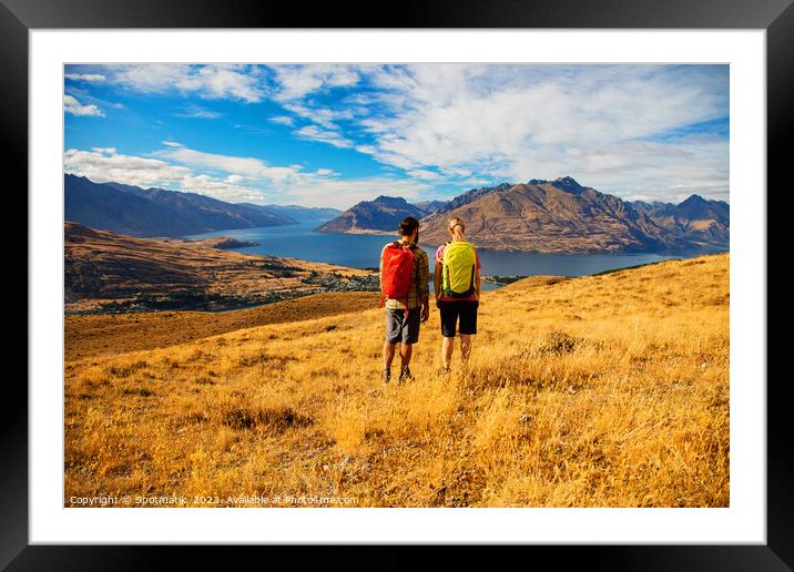 Adventure couple on vacation hiking trip South Island Framed Mounted Print by Spotmatik 