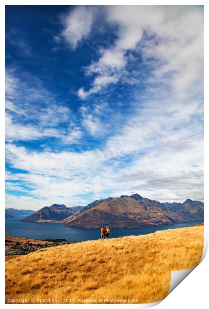 Male female hikers viewing Lake Wakatipu New Zealand  Print by Spotmatik 