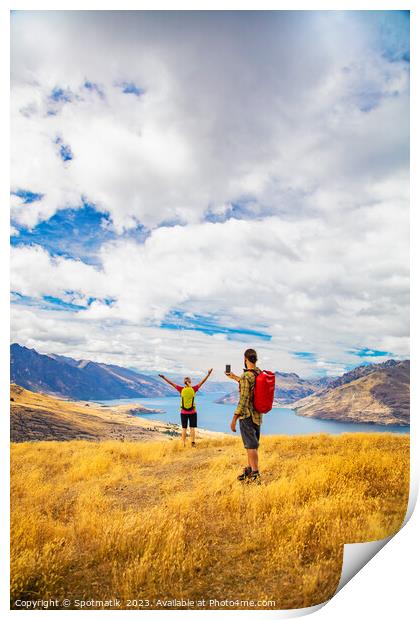 Young male taking picture of female friend Queenstown Print by Spotmatik 