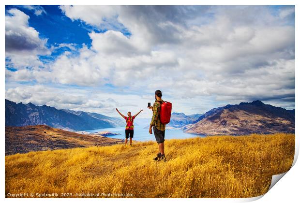 Backpacking young couple taking smartphone picture Lake Wakatipu  Print by Spotmatik 