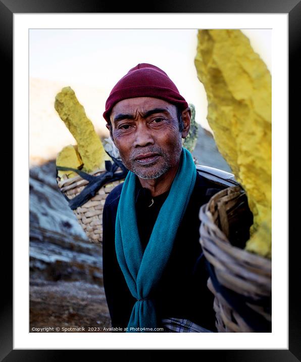 Sulphur blocks carried by male Indonesian worker Asia Framed Mounted Print by Spotmatik 