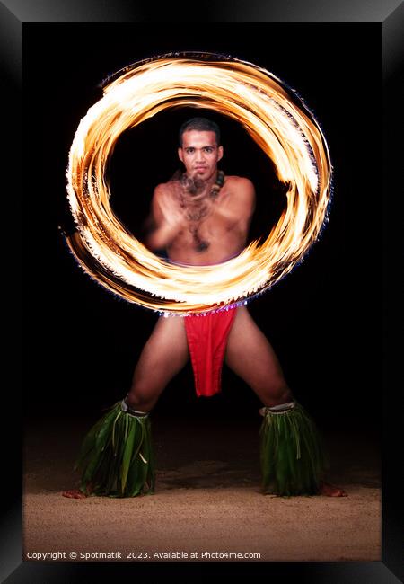 Male Fire dancer illuminated spinning flaming torch Polynesia  Framed Print by Spotmatik 