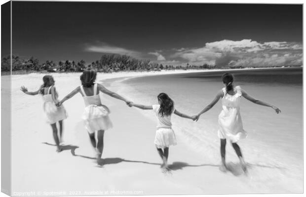 Happy Beach family in white walking holding hands  Canvas Print by Spotmatik 