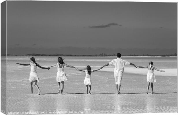 Healthy Caucasian family together on beach vacation Bahamas Canvas Print by Spotmatik 