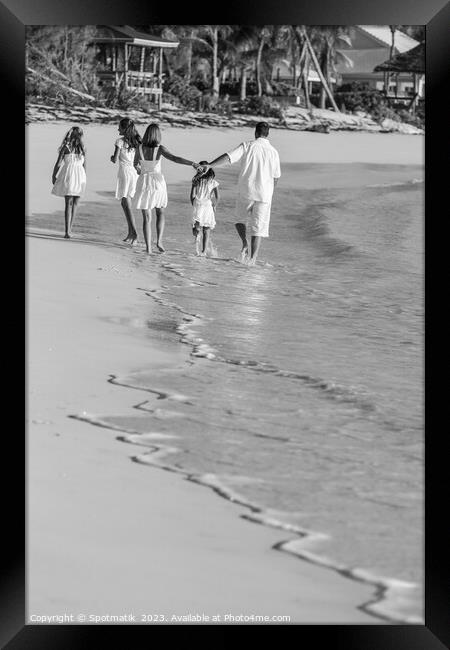 Young Caucasian girls parents on tropical island beach Framed Print by Spotmatik 