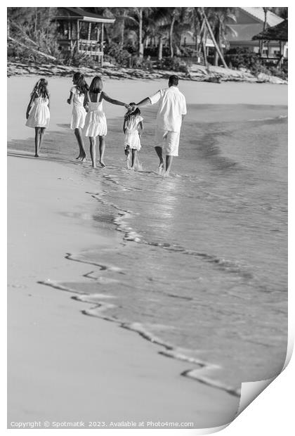 Young Caucasian girls parents on tropical island beach Print by Spotmatik 