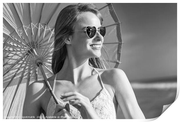 Smiling American hippy chic with parasol on beach Print by Spotmatik 