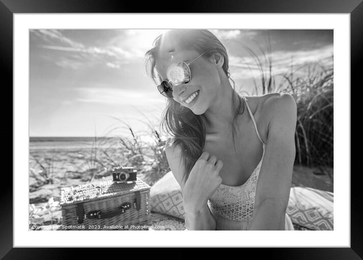 Smiling Holiday girl relaxing on blanket at beach Framed Mounted Print by Spotmatik 